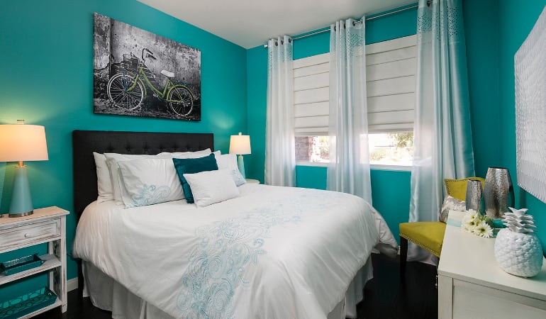 Roman shades in a Bluff City bedroom